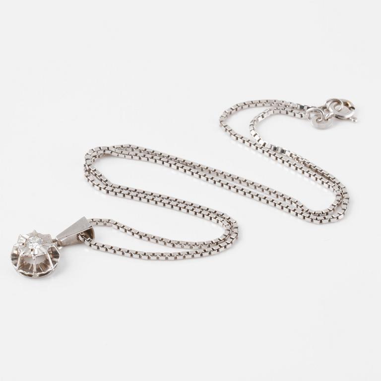 HÄNGE, 18K vitguld med briljantslipad diamant 0.20 ct. Vikt 8 gram.