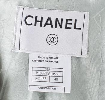 A 2001s light blue coat by Chanel.