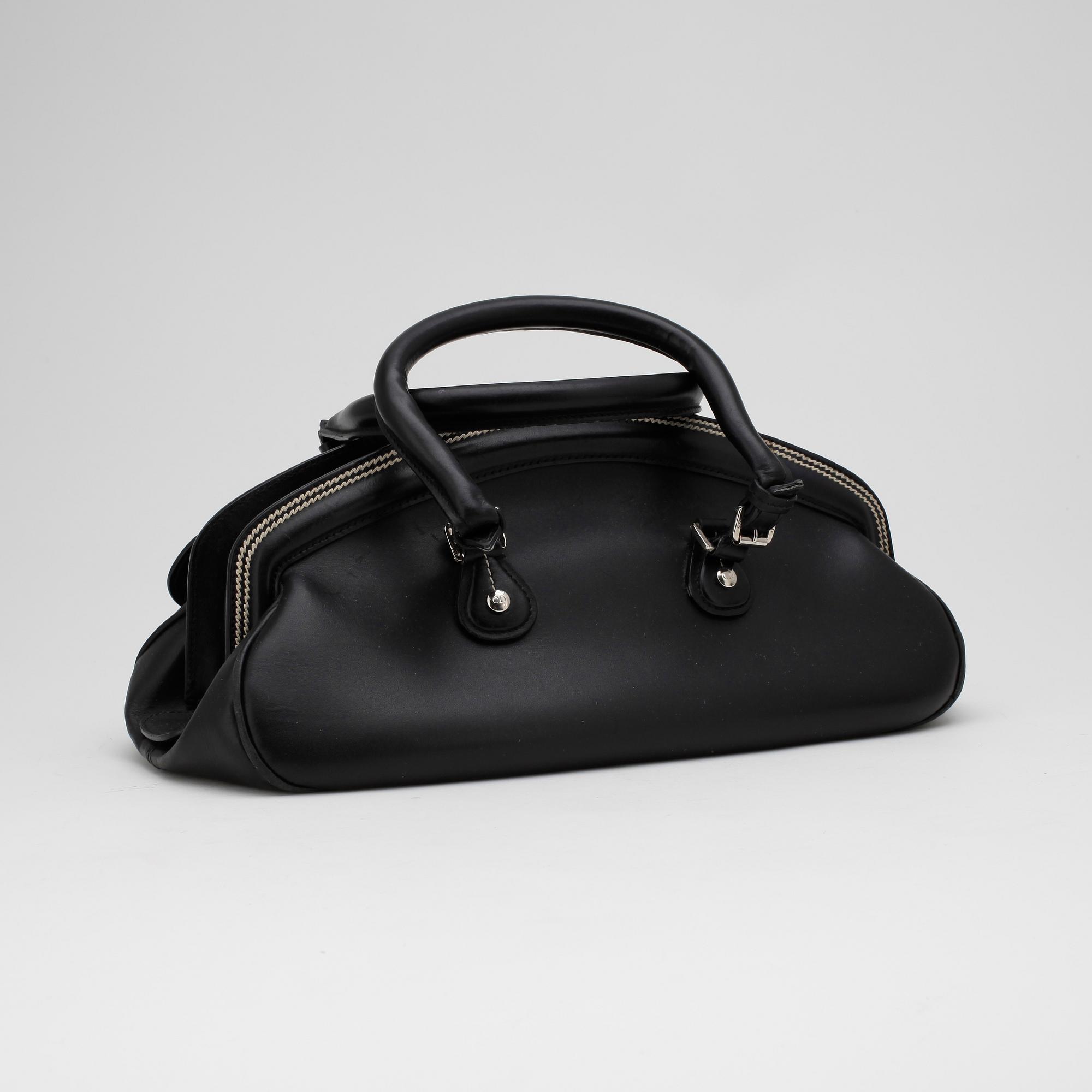 CHRISTIAN DIOR, a 21th century black leather handbag.
