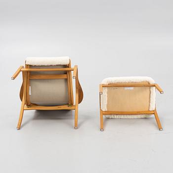 Yngve Ekström, a 'Lamino' armchair and a foot stool, Swedese.