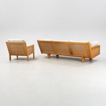 A oak sofa and easy chair, 1960s/70s.