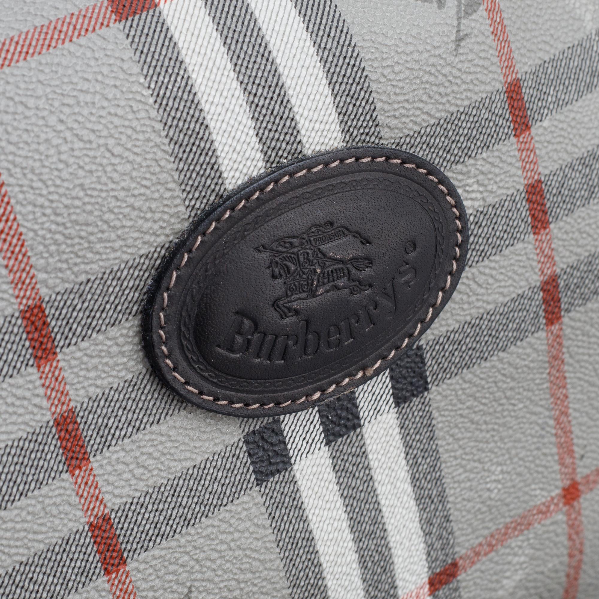 Burberry, a canvas weekend bag.