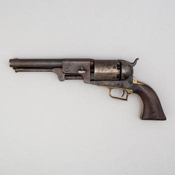 A Colt Dragoon percussion revolver no 9344 manufactured 1850.