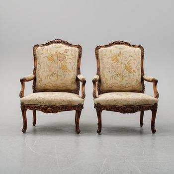 A pair of Louis XV style armchairs from early 20th Century.
