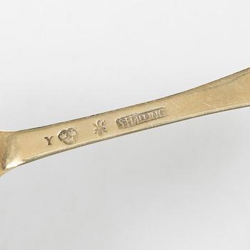 A Swedish silver gilt spoon, and a silver serving spoon, 18-19th Century.