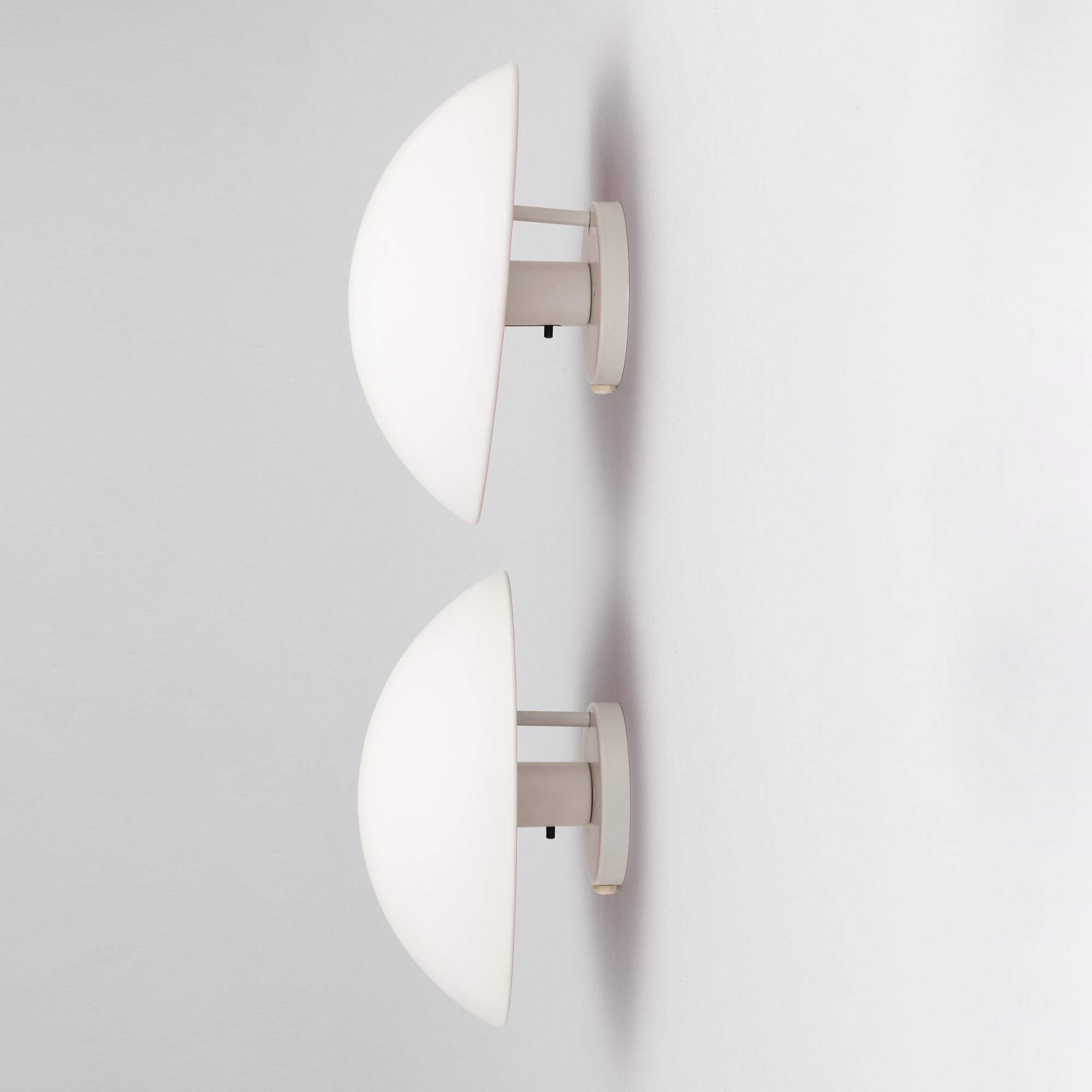 Poul Henningsen, a pair of 'PH Hat' wall lights, Louis Poulsen, Denmark.