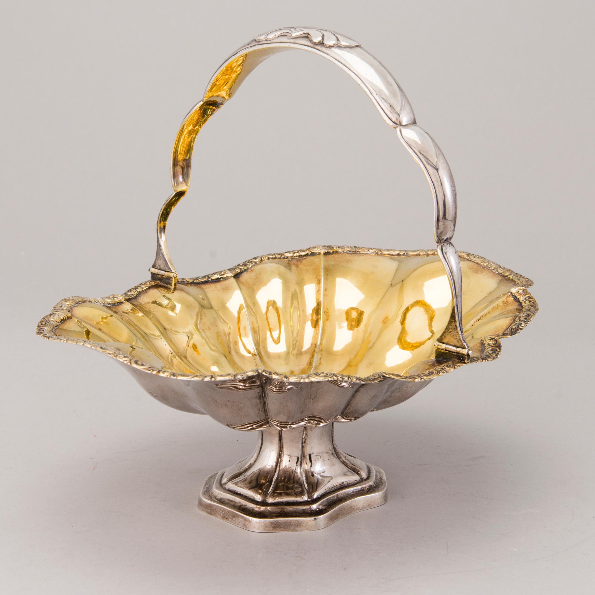 GOTTFRIED ERHARD DEHIO, A parcel-gilt footed silver bread basket, Reval / Tallinn 1829-42. Finnish control marks.