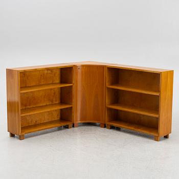 A corner bookcase, three sections, 1940's.