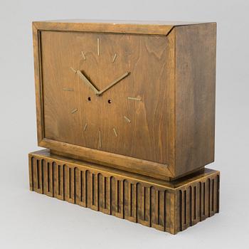 Axel Einar Hjorth, a stained birch "Caesar" mantel clock, Nordiska Kompaniet, Sweden 1920-30's.