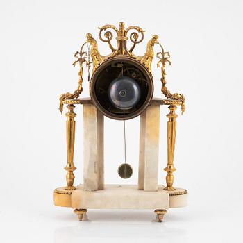 A Louis XVI marble and ormolu portico clock, the dial signed Bouchet, late 18th century.