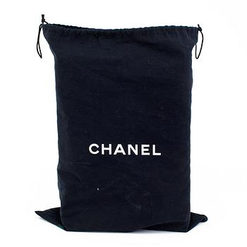 A "Grand Shopping Tote" by Chanel 2015/2016.