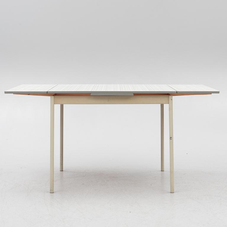 A table and four chairs, mid-20th Century.