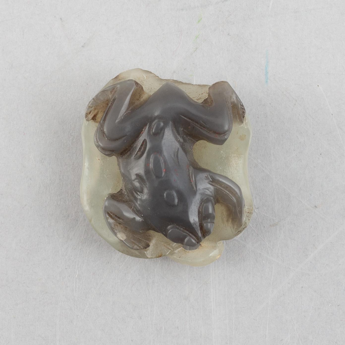 A group of three Chinese stone charms, 20th century.