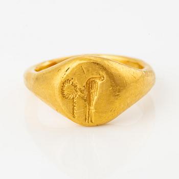 A possibly Egyptian gold signet ring from the Greco-Roman era.