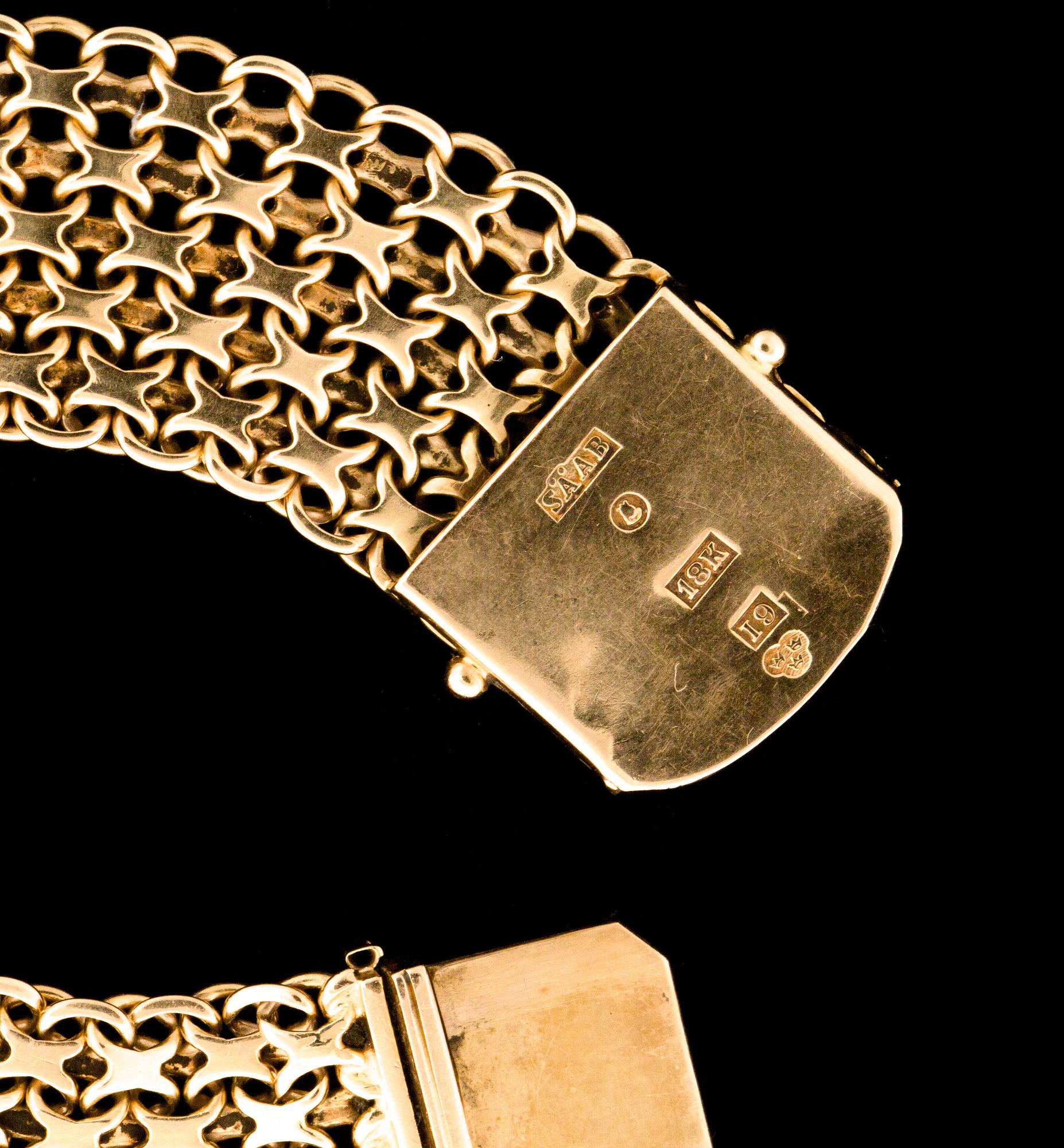 ARMLÄNK, 18K guld. Stockholms Ädelsmide AB, Stockholm. 1959. Vikt ca 33 gram.