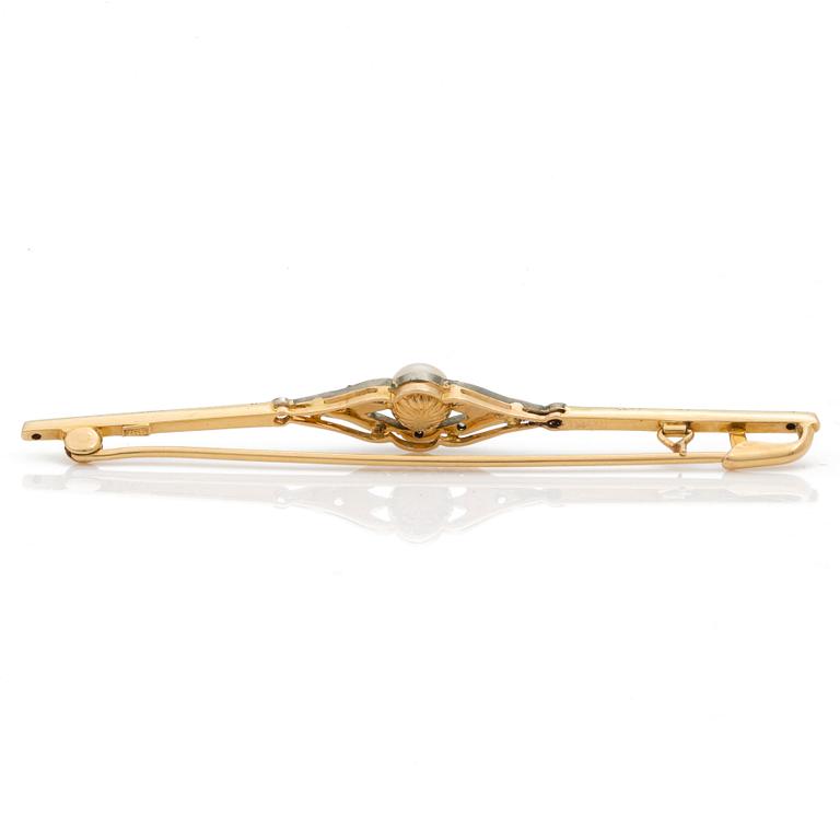 A bar brooch set with a cultured pearl and diamonds.
