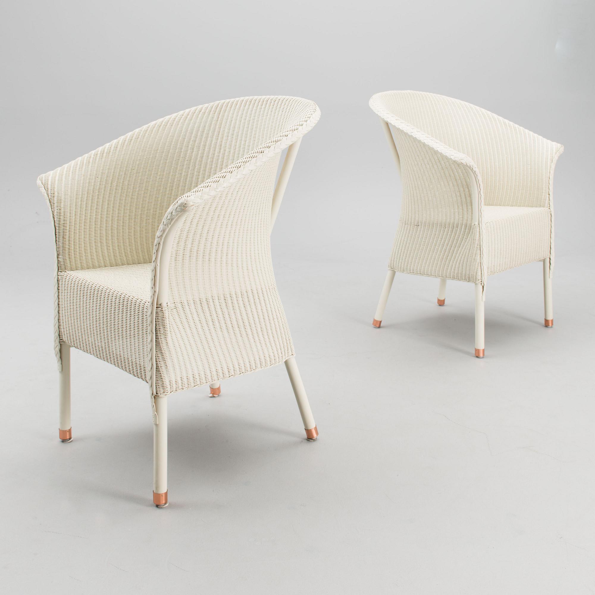 A PAIR OF ARM CHAIRS, Lloyd Loom, Spalding, England,  21st century.