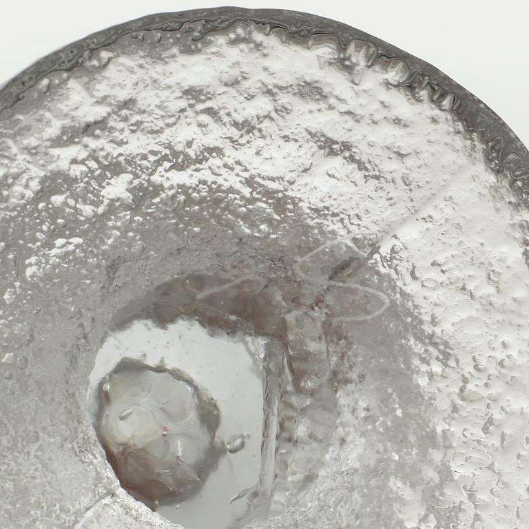 Five glass candlesticks by Timo Sarpaneva for Iittala, model "Festivo", second half of the 20th century.