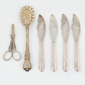 Four knives, a scissor and a spoon, including Anders Lunqvist, Stockholm 1833.
