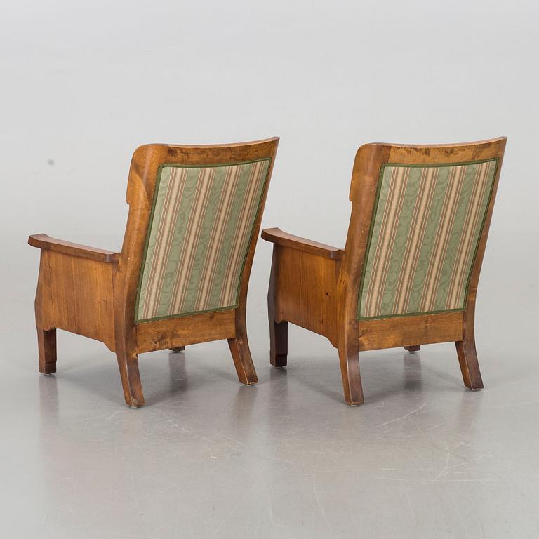 A PAIR OF EASY CHAIRS 1920'S.