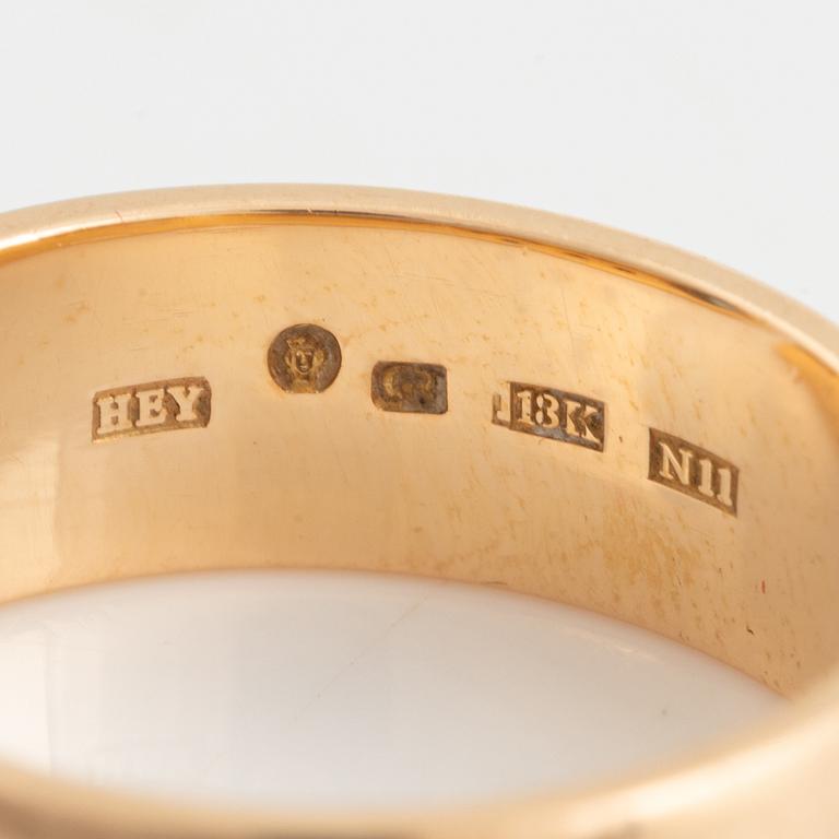 Ring 18K guld med briljantslipade diamanter och turmalin.