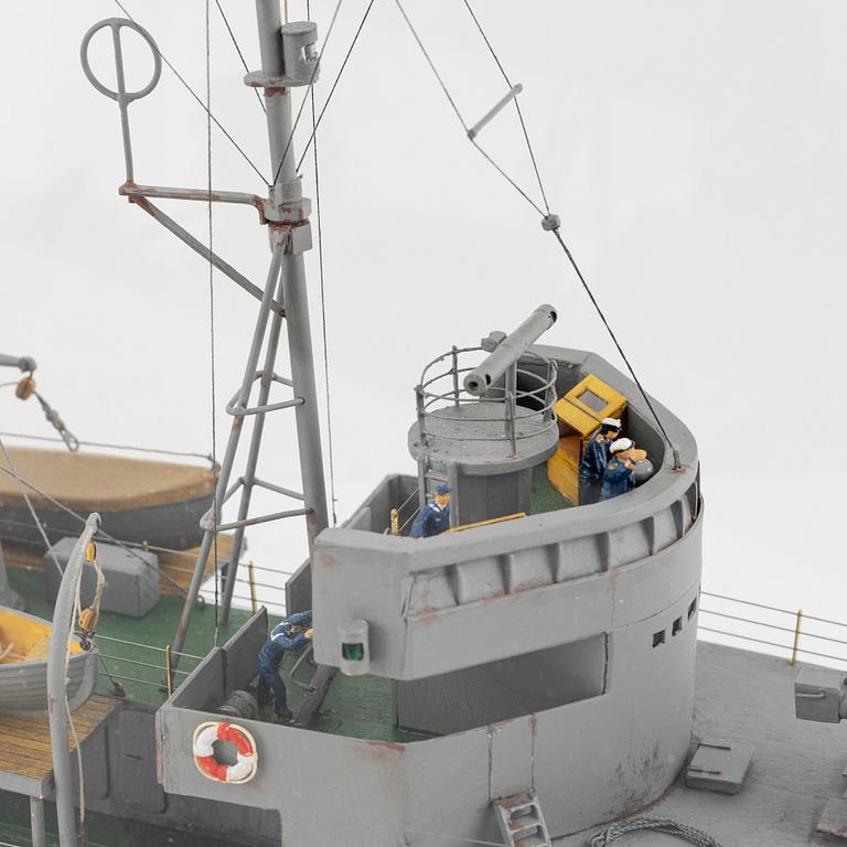 A wooden scalemodel of the Swedish minesweeper 'HMS Ulvön', built by Ingvar Lyckhammar.
