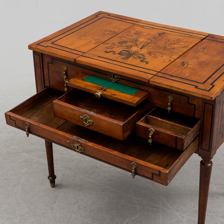 An end of the 18th century dressing  table with drawers and mirror.