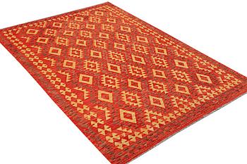 A Kilim carpet, c. 303 x 198 cm.