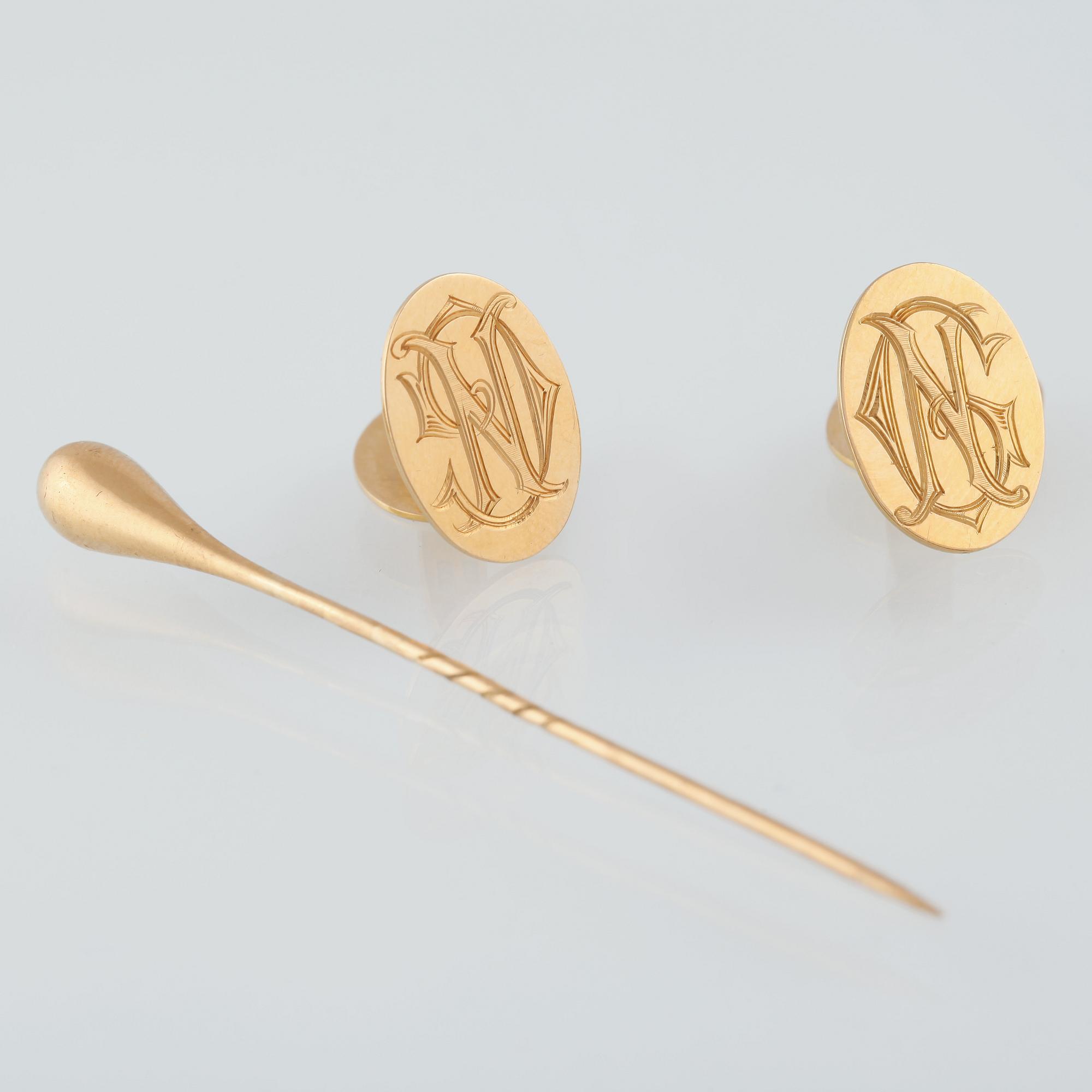 MANSCHETTKNAPPAR samt NÅL, 18K guld, delvis Gustaf Adolf Heribert Linder, Stockholm, 1927. Vikt 10,9 gram.