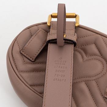 Gucci, a leather belt bag.