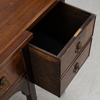 A mahogany-veneered sideboard, England, around 1900.