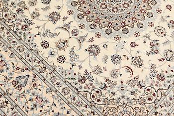 A Nain part silk carpet, c. 207 x 208 cm.