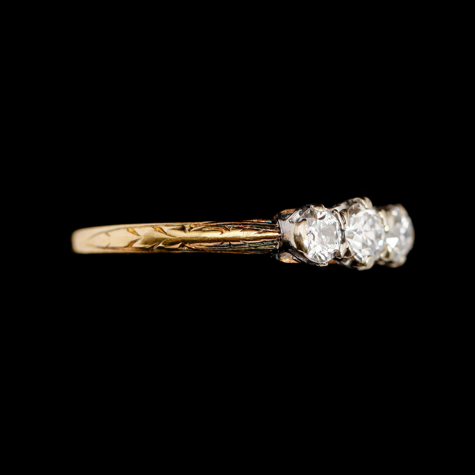 RING, 18 k guld, 3 diamanter tot ca 0.60 ct.
