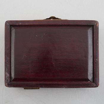 Two Chinese hardwood boxes with nephrite plaques, 20th century.