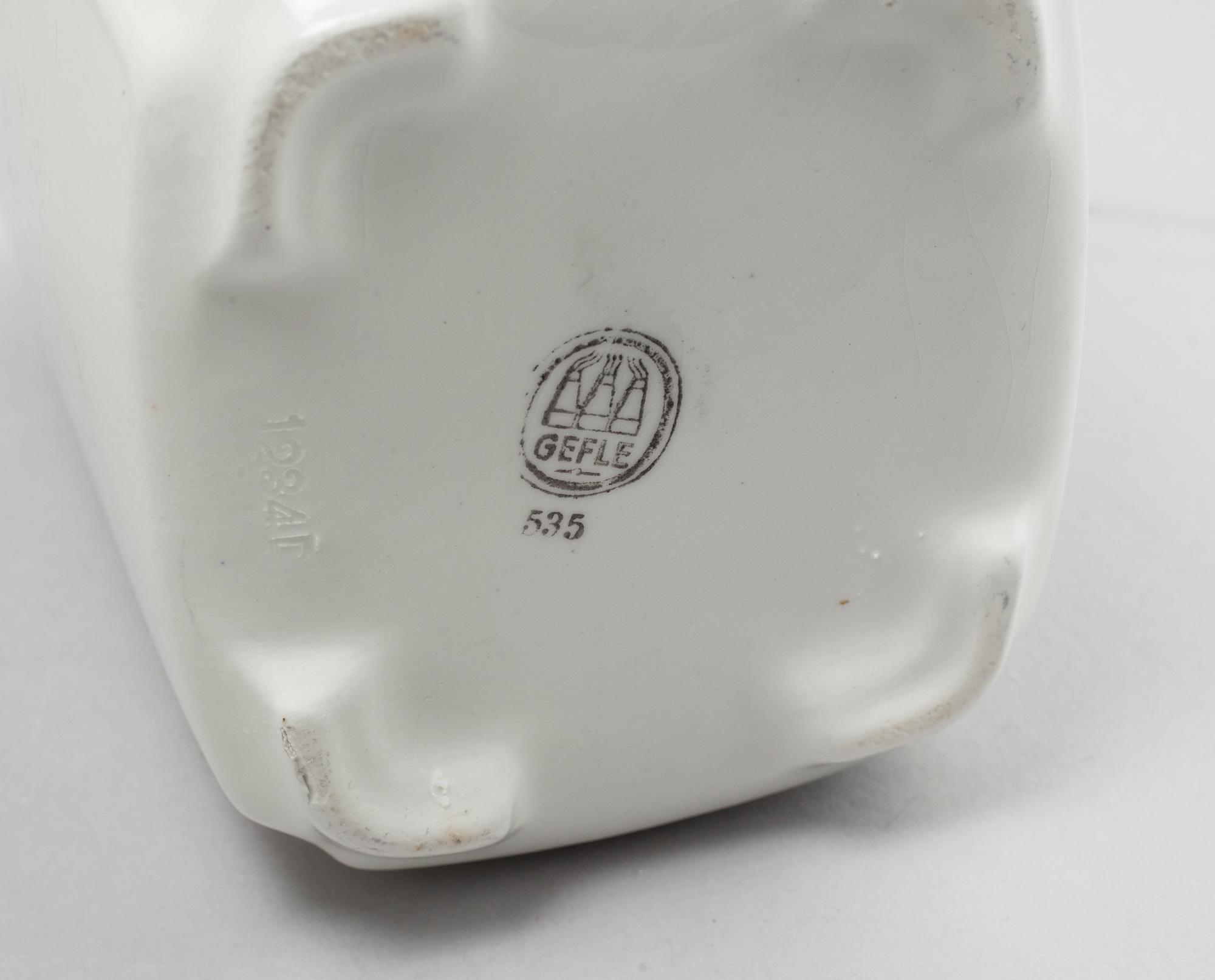 A set of earthenware kitchen jars from Gefle, first half of the 20th century.