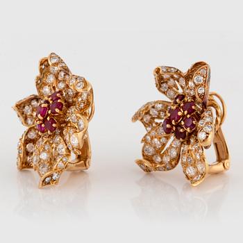 A pair of 18K gold earrings Monture Boucheron set with rubies and old- and eight-cut diamonds.