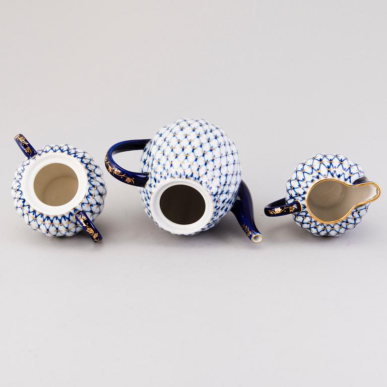 A 22-piece Lomonosov Cobalt Net porcelain set for coffee and tea, USSR.