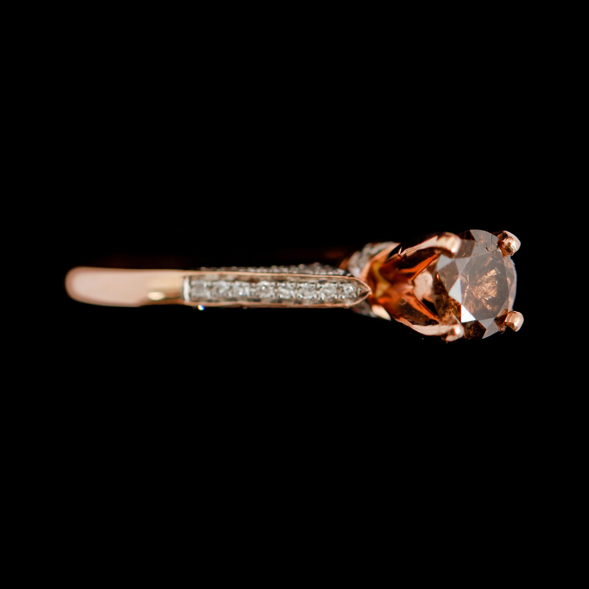 RING, 14 k roseguld, briljantslipade diamanter tot ca 0.95 ct.