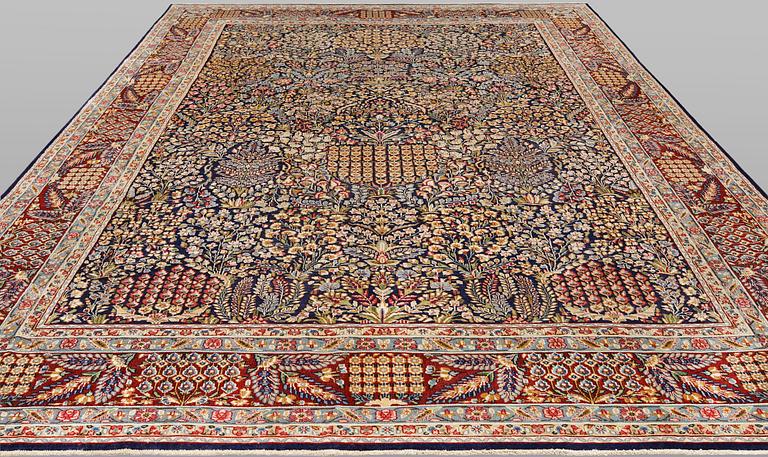 A 'Millefleur' Kerman carpet, c. 393 x 266 cm.