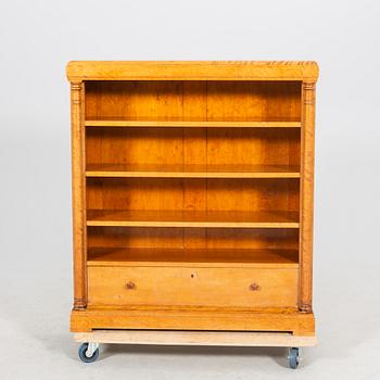 A birch Empire style early 1900s book shelf.