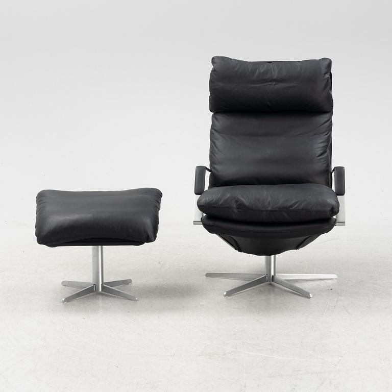 A leather 'SL 330' swivel chair and ottoman, Søren Lund, Denmark.