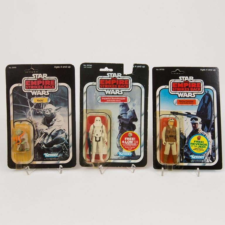 A lot of six Star Wars action figures in original packaging Kenner 1980s.