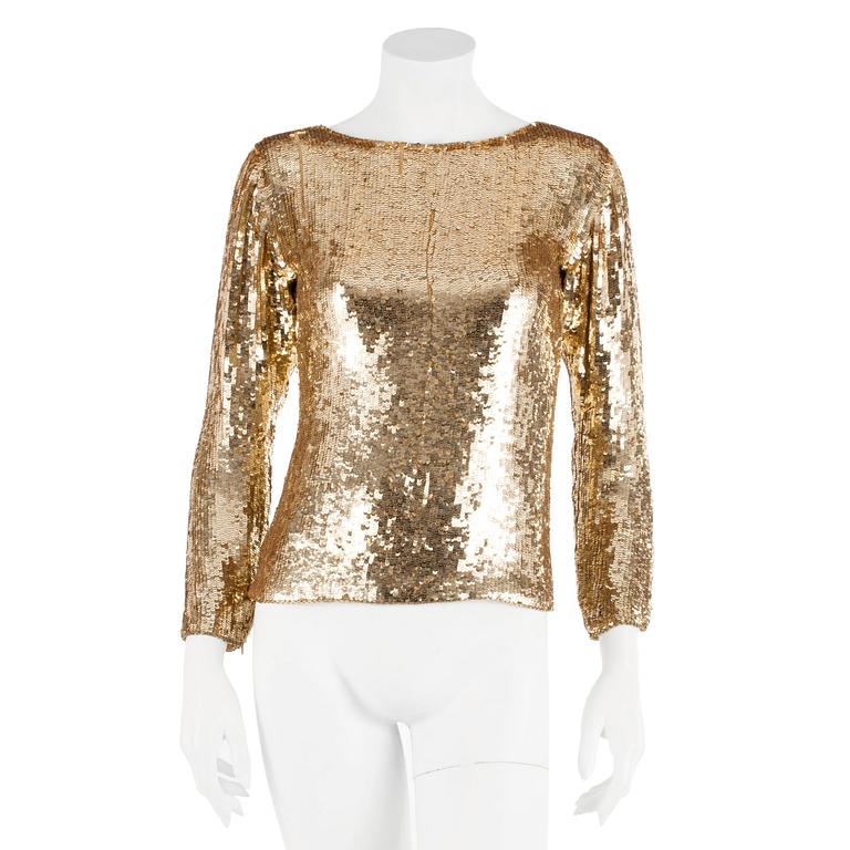 YVES SAINT LAURENT, a golden tinsel eveningjacket, size small.