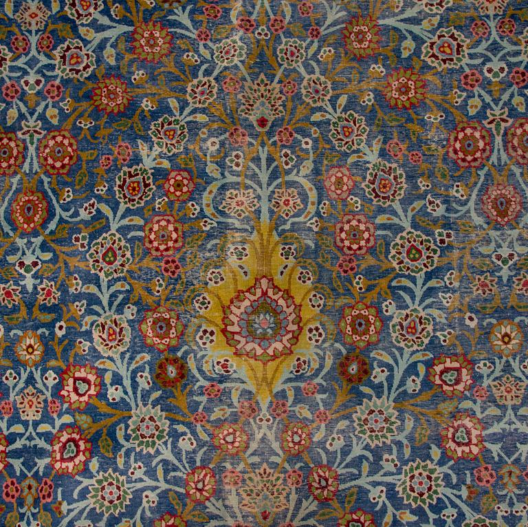 A PERSIAN CARPET. Early 20th century. Ca 687x470 cm.