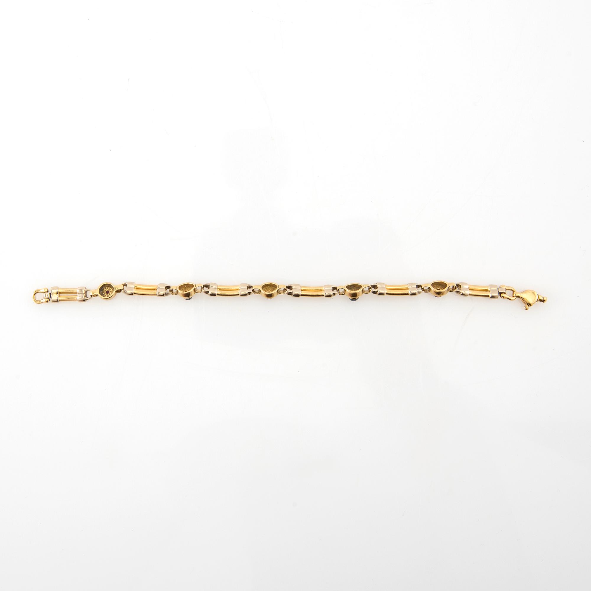 Bracelet 18K rose and white gold set with cabochon-cut sapphires and rubies, possibly Ancona Italy.