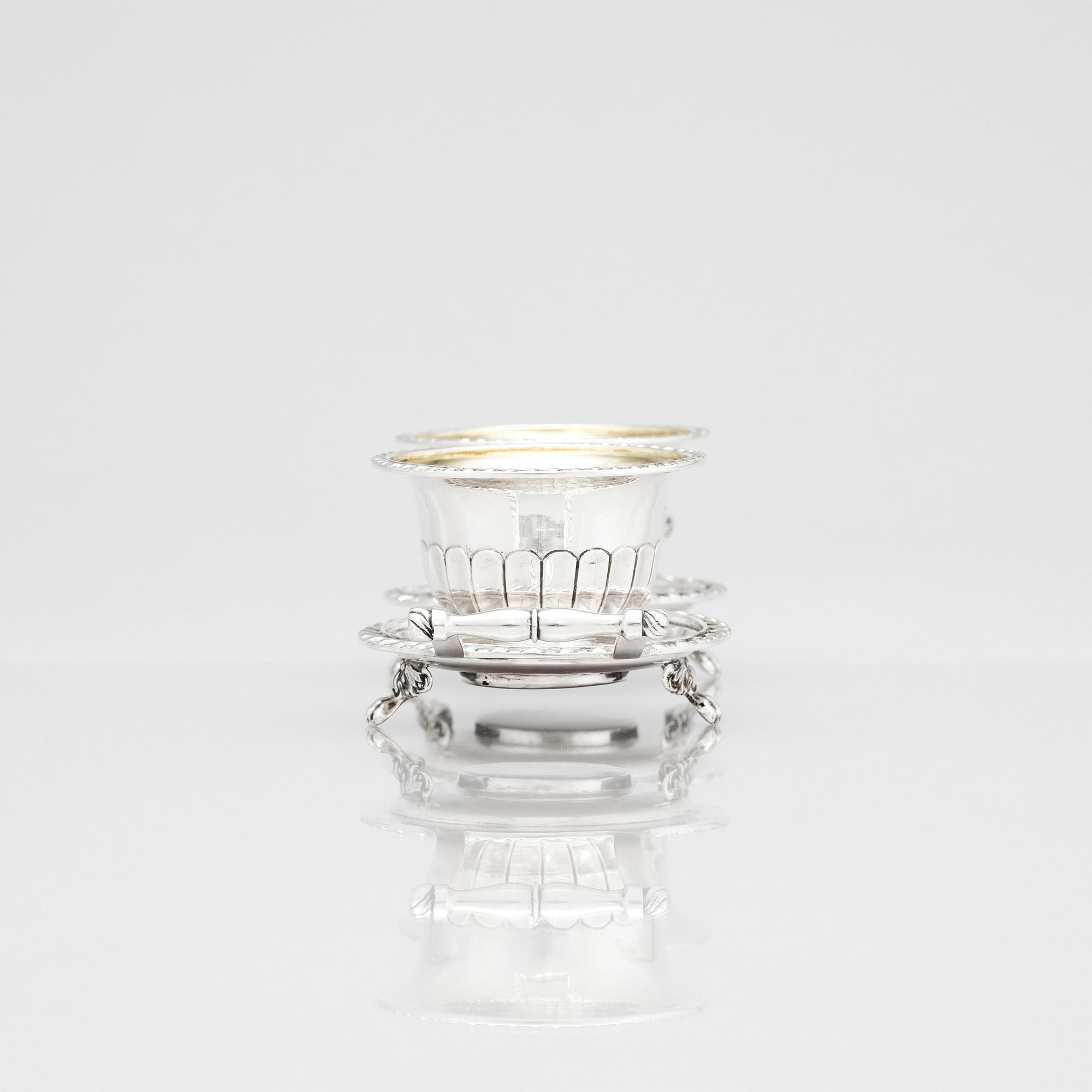 A pair of Swedish candy bowls with stand, parcel-gilt silver, mark of Gustaf Möllenborg, Stockholm 1851.