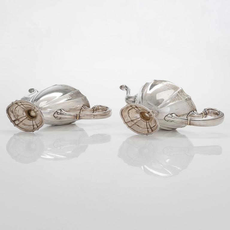 A five-piece sterling silver coffee and tea service, and 12 spoons, USA, first quarter of the 20th century.