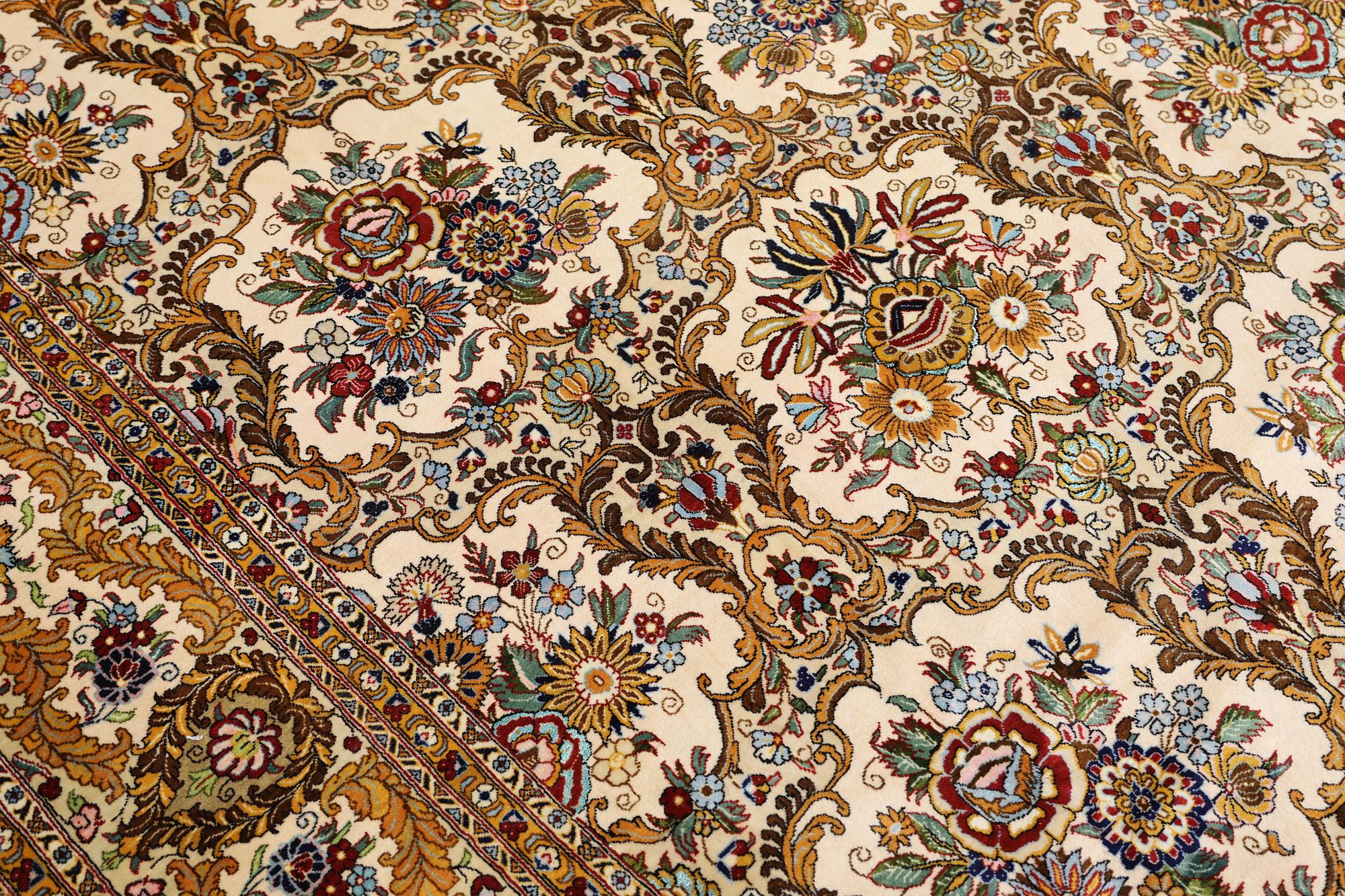 A part silk Ghom carpet, c. 420 x 310 cm.
