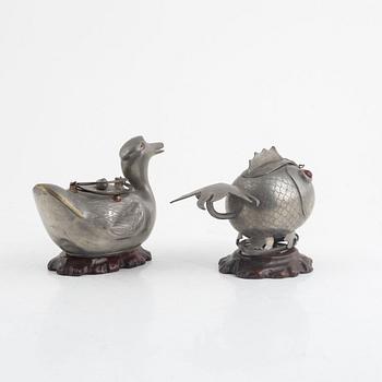 Two Chinese pewter teapots, late Qing dynasty.