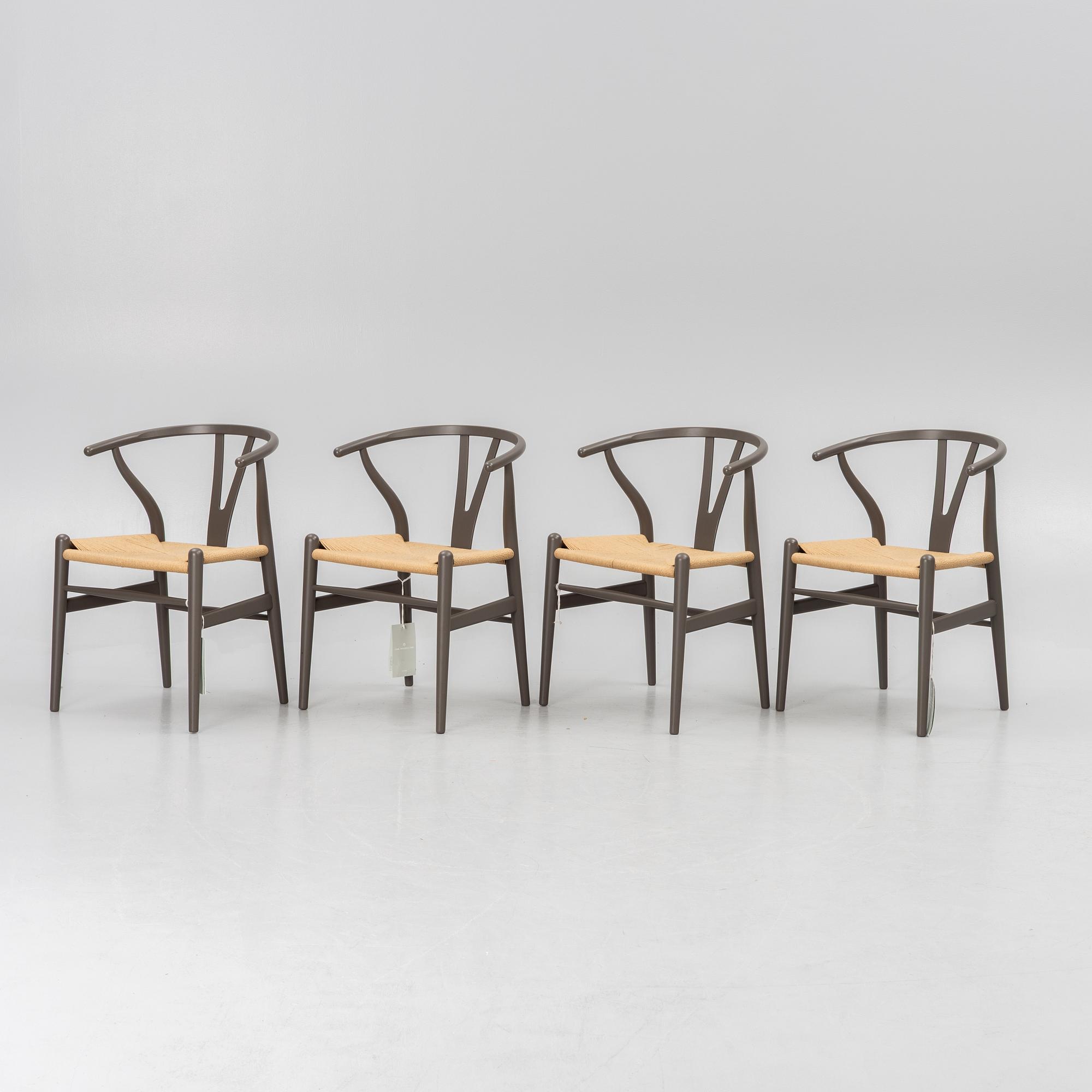 Hans J. Wegner, four CH 24 chairs, Carl Hansen & Son, Denmark.